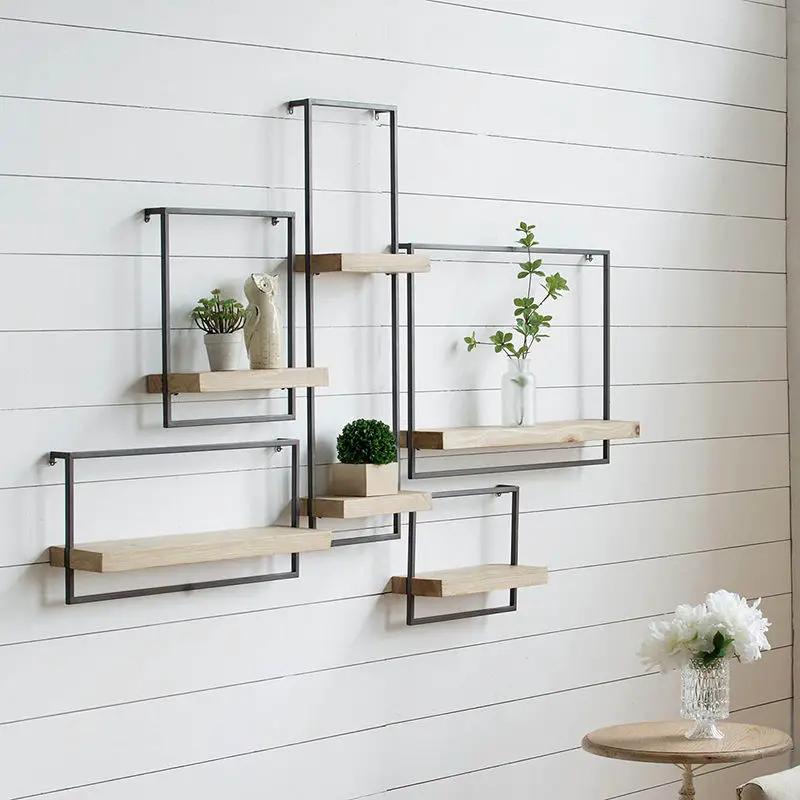 Wall shelves with black metal frames and natural wood planks by Unique Piece Furniture on Tampa Home & Garden Store