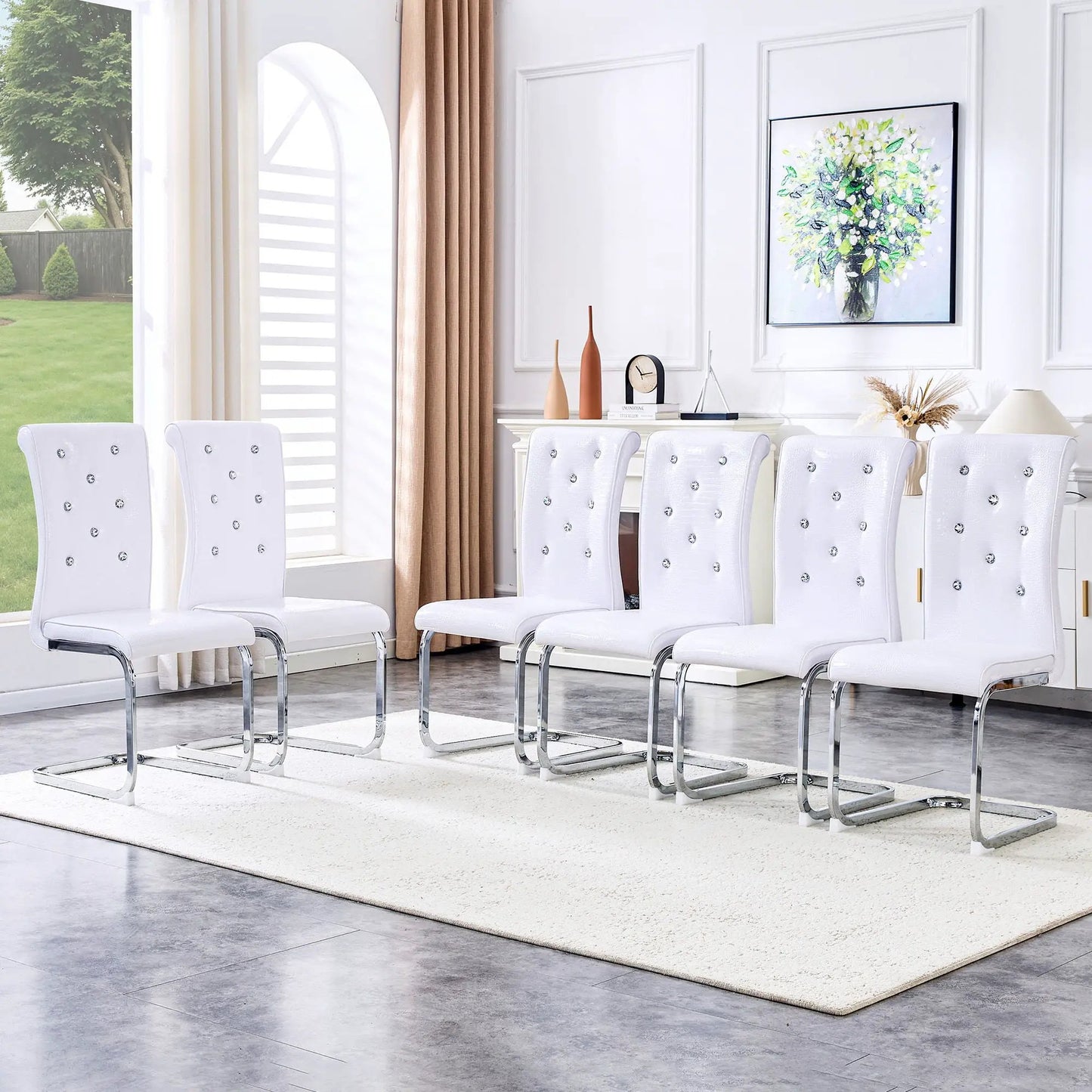 Elegant Design Upholstered Dining Chairs in white leather with tufted studs and chrome bases on Tampa Home & Garden Store