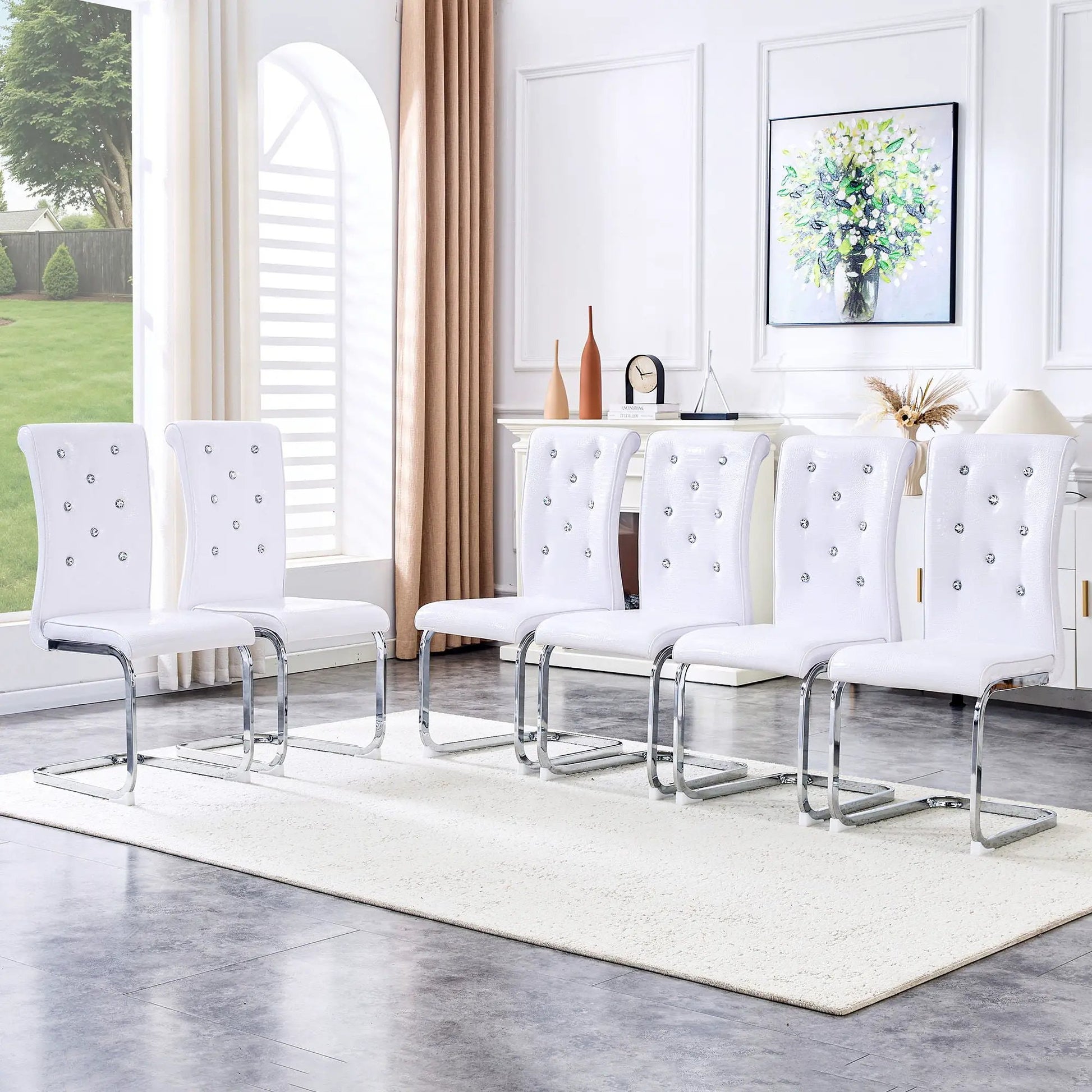Elegant Design Upholstered Dining Chairs in white leather with tufted studs and chrome bases on Tampa Home & Garden Store