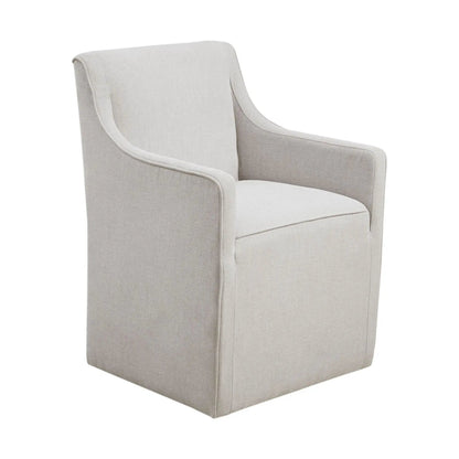 Traditional skirted dining arm chair in beige fabric with clean lines on Tampa Home & Garden Store