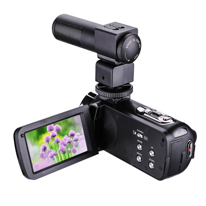 HDV-301STRM HD camera with external microphone on black camcorder; LCD shows purple flowers on Tampa Home & Garden Store