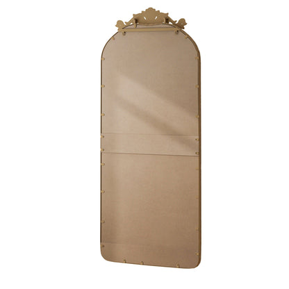 Back view of a full-body arched wall mirror with vintage carved bronze applique topper on Tampa Home & Garden Store
