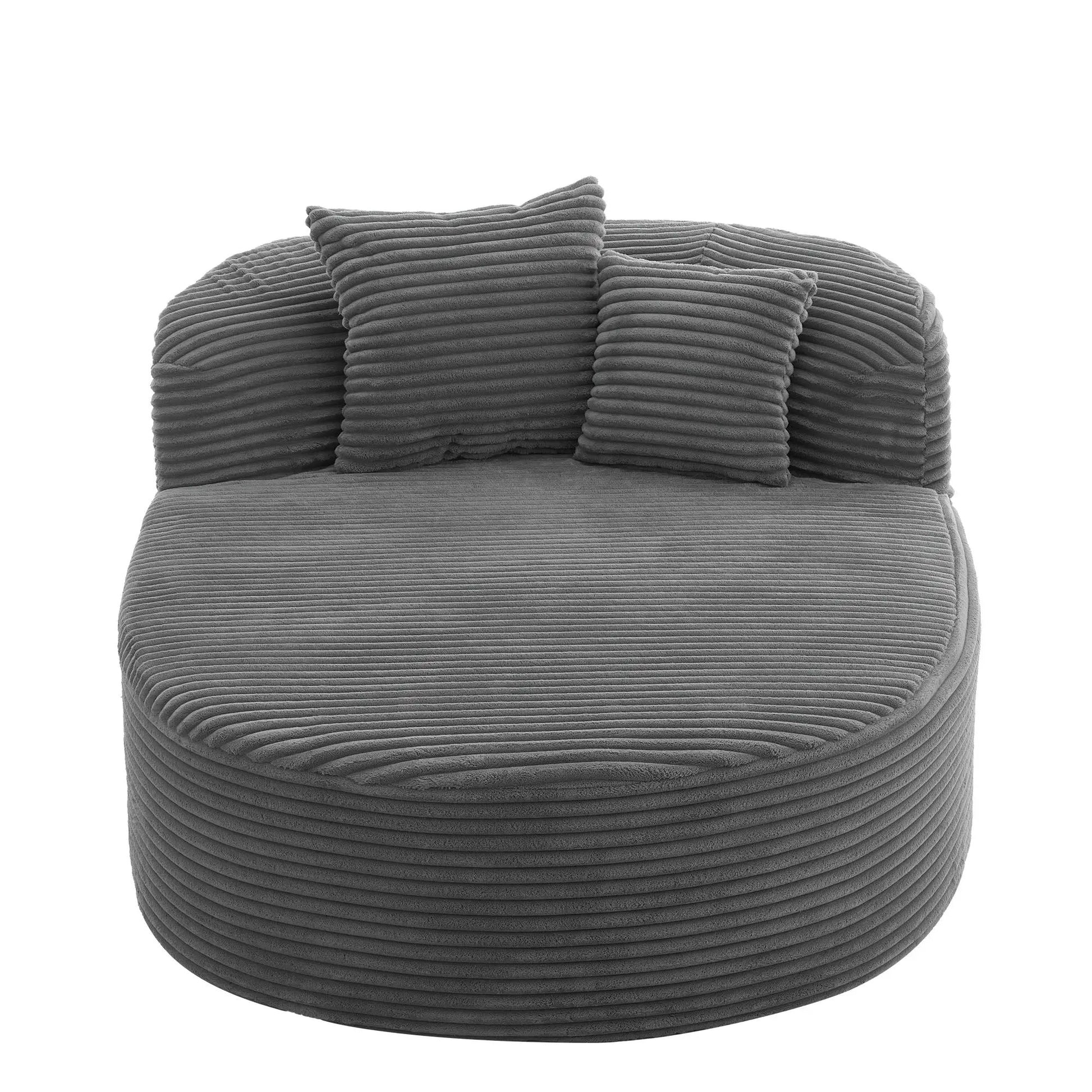 Modern chaise lounge with ribbed gray upholstery and plush supportive pillows on Tampa Home & Garden Store