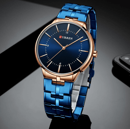 Men's waterproof watch with blue stainless steel bracelet, rose-gold case, Curren dial on Tampa Home & Garden Store