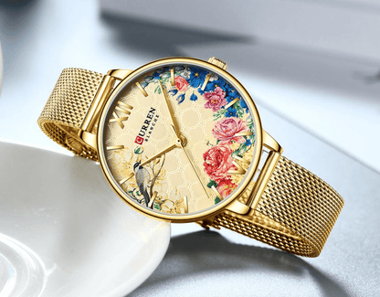 Womens Stevvex gold-tone mesh watch with floral decoupage dial and large Roman numerals on Tampa Home & Garden Store