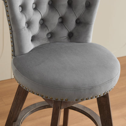 Counter-height velvet bar stool in grey with tufted back and brass nailhead trim on Tampa Home & Garden Store