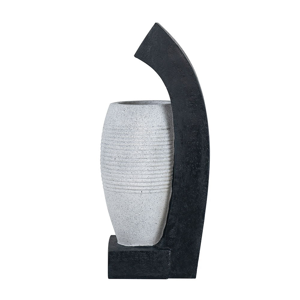 Water fountain with vase design by HouseOfZazla, black curved arch around speckled vase on Tampa Home & Garden Store
