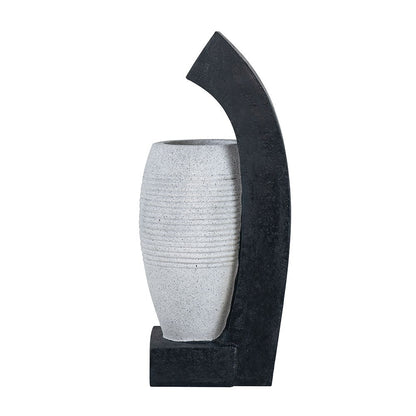 Water fountain with vase design by HouseOfZazla, black curved arch around speckled vase on Tampa Home & Garden Store