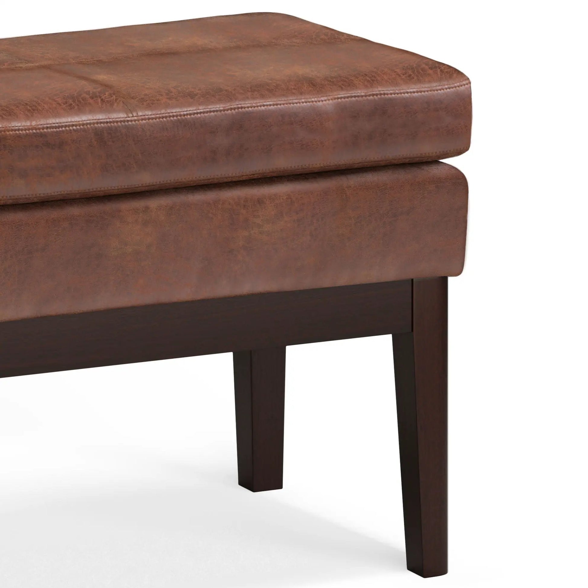 Carlson ottoman bench in brown leather with dark wood legs, mid-century design on Tampa Home & Garden Store