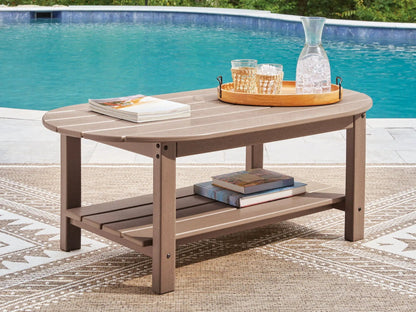 Grover Beach oval coffee table brown wood finish Unique Piece Furniture with shelf on Tampa Home & Garden Store