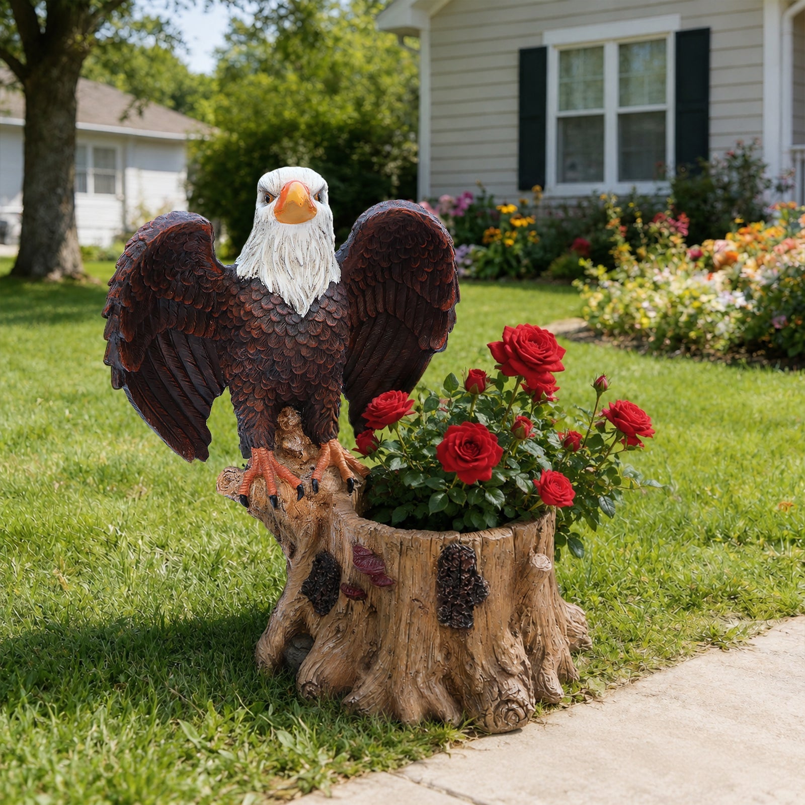 Majestic eagle garden planter statue with spread brown wings and white head on a carved stump on Tampa Home & Garden Store