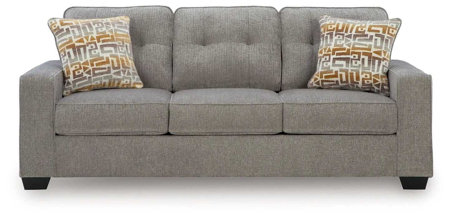 Larimer stationary sofa in gray fabric by Unique Piece Furniture with geometric pillows on Tampa Home & Garden Store