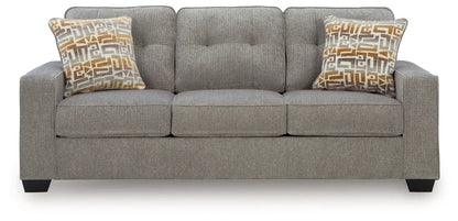 Larimer stationary sofa in gray fabric by Unique Piece Furniture with geometric pillows on Tampa Home & Garden Store