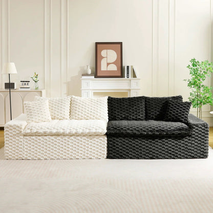 Luxury multifunctional sofa for living room display with white and black knitted throws on Tampa Home & Garden Store