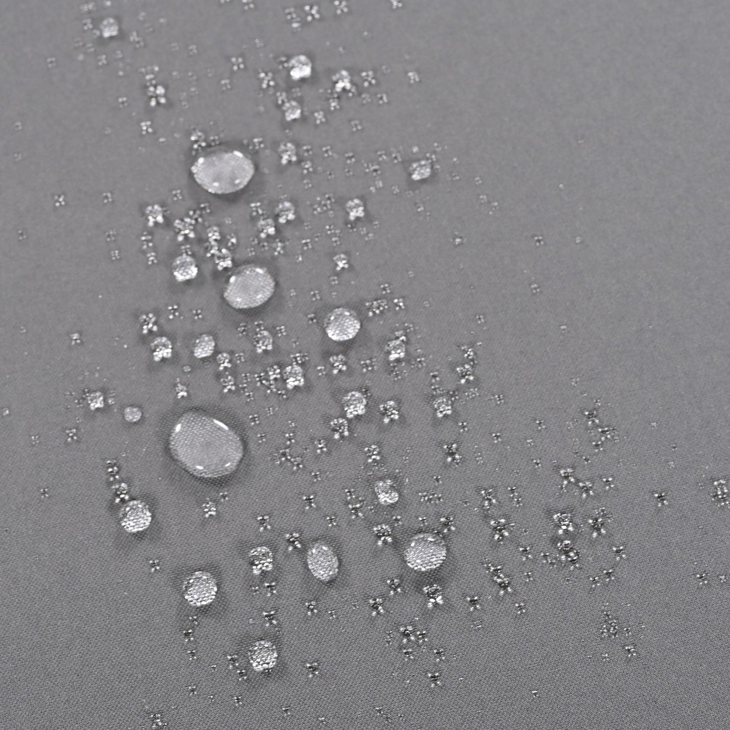 Close-up of dew droplets on dark grey outdoor fabric on Tampa Home & Garden Store
