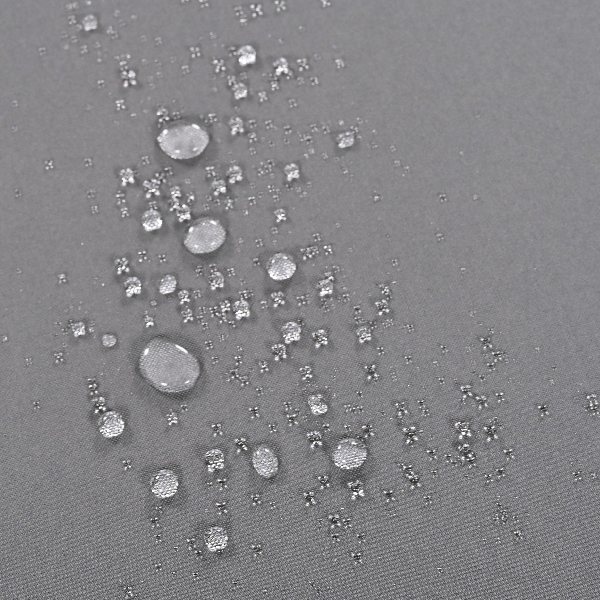 Close-up of dew droplets on dark grey outdoor fabric on Tampa Home & Garden Store