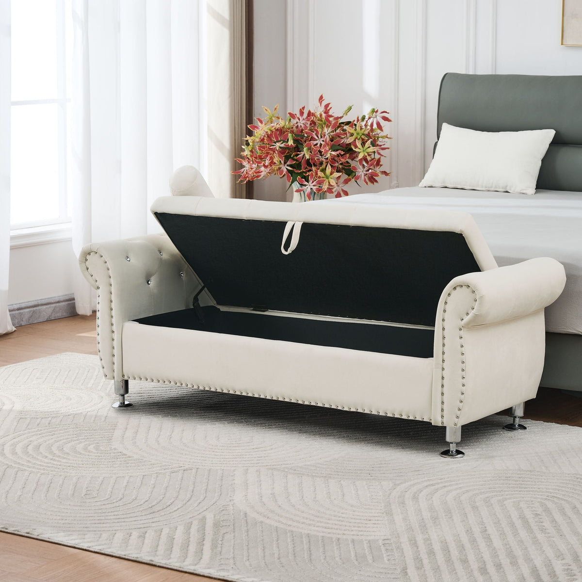 Storage bench with crystal button trim, white faux leather, chrome legs in bedroom scene on Tampa Home & Garden Store