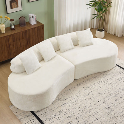 Modern Curved Sofa and the Soft Linen Pillows
