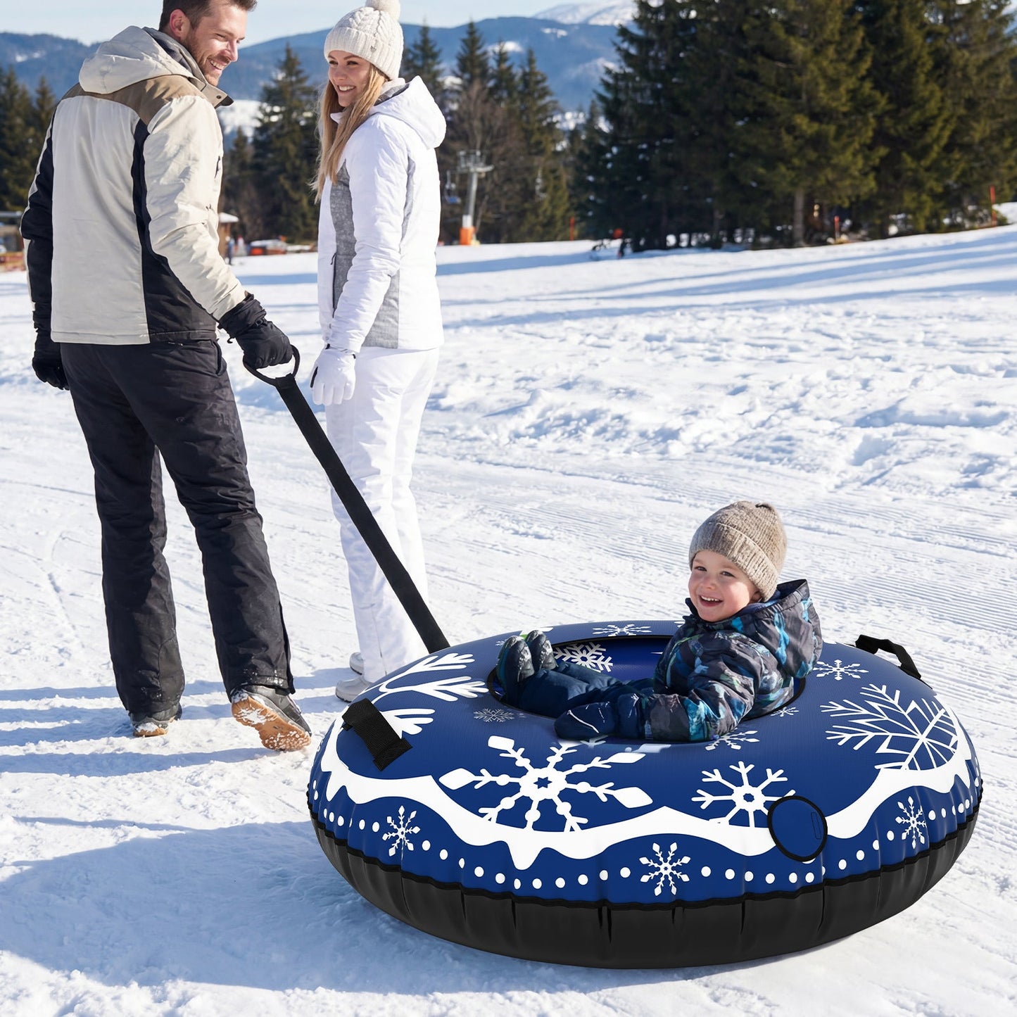 42-inch heavy-duty inflatable snow tube in blue with print; child rides, tow strap visible on Tampa Home & Garden Store