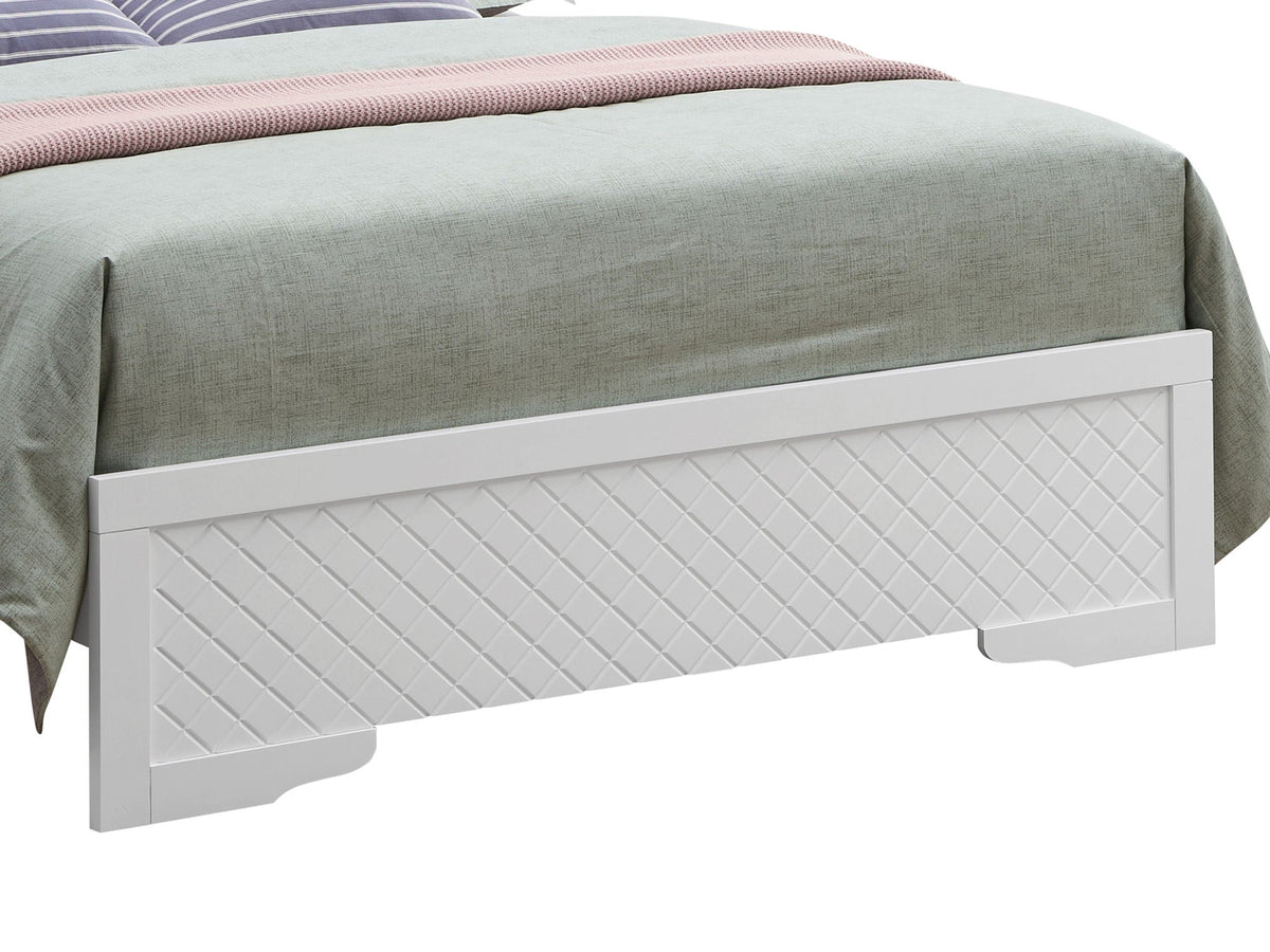 Upholstered bed in gray fabric with white diamond-pattern footboard drawers; pink throw on Tampa Home & Garden Store