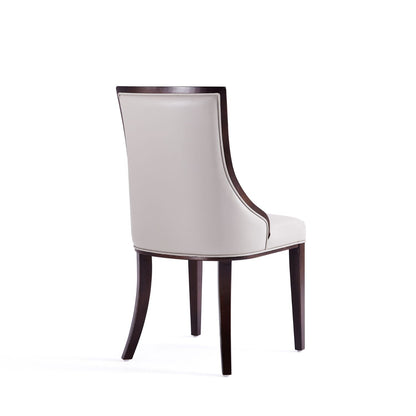 Rear view of grand dining chair with beige upholstery and dark beech wood frame on Tampa Home & Garden Store