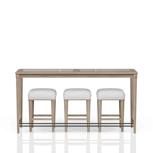 Glass console table with frosted top and 3 white upholstered stools under a light wood frame on Tampa Home & Garden Store