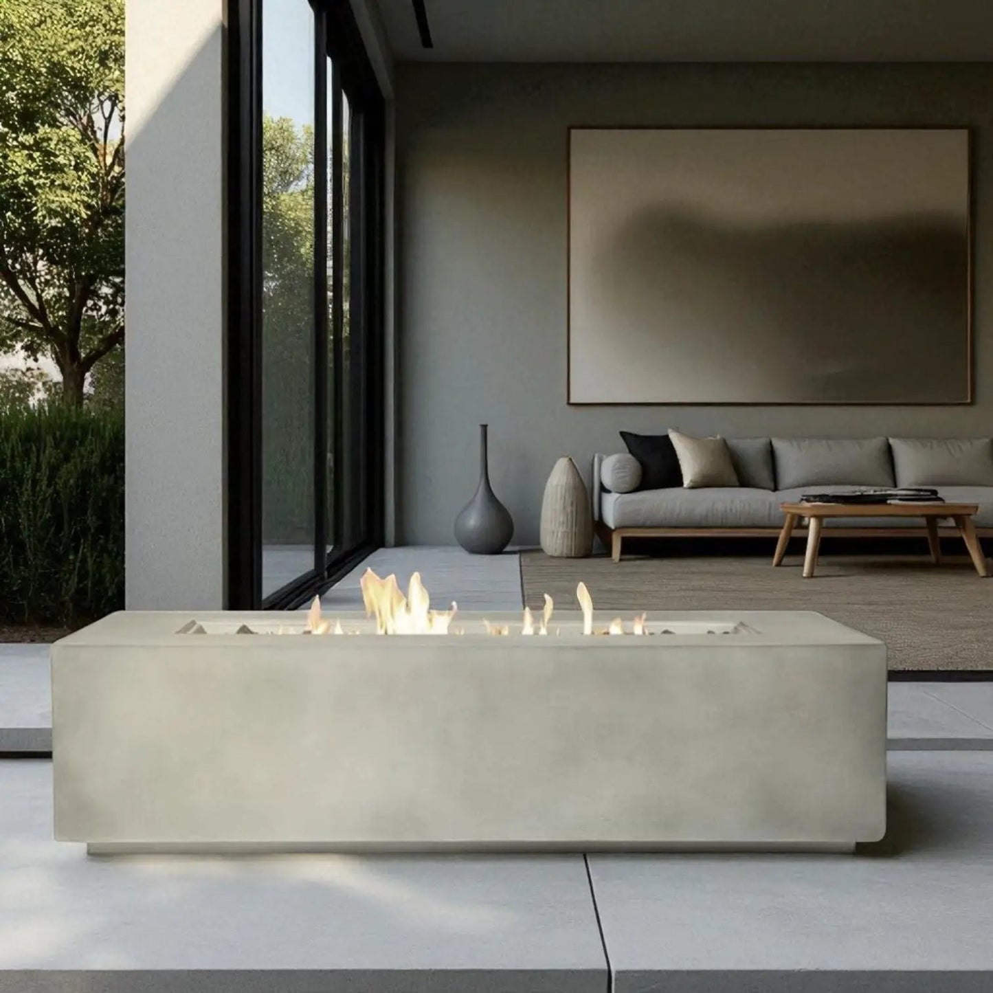 Fire pit table lightweight concrete with propane flames by Unique Piece Furniture on patio on Tampa Home & Garden Store