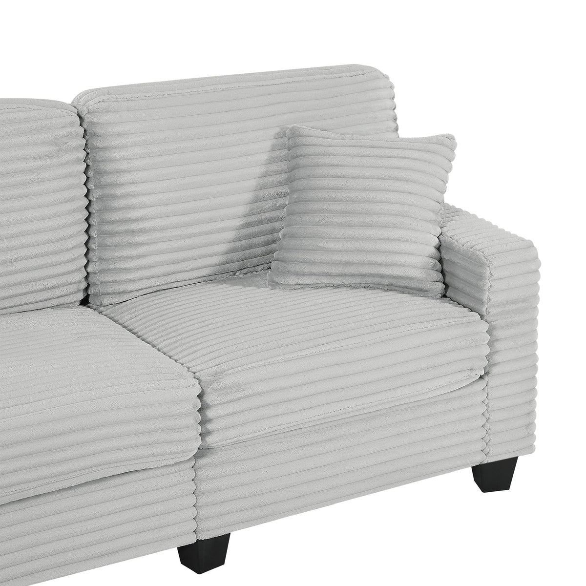Upholstered U-shaped sectional sofa cushions in light gray ribbed fabric with black angled legs on Tampa Home & Garden Store