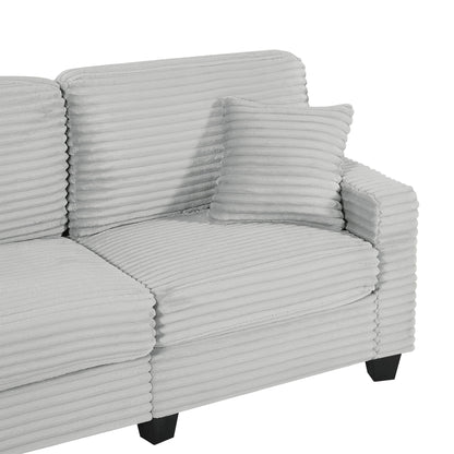 Upholstered U-shaped sectional sofa cushions in light gray ribbed fabric with black angled legs on Tampa Home & Garden Store