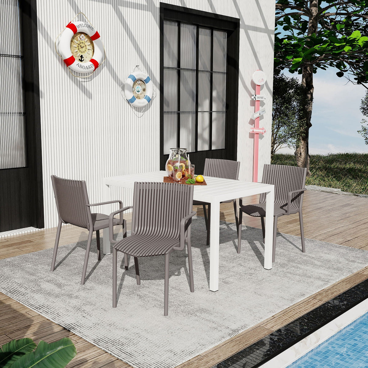 4 Modern Stackable Armchairs and Long Table