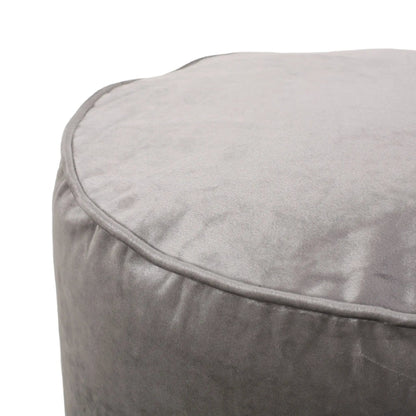 Shimon cylinder pouf ottoman in light gray suede fabric on Tampa Home & Garden Store