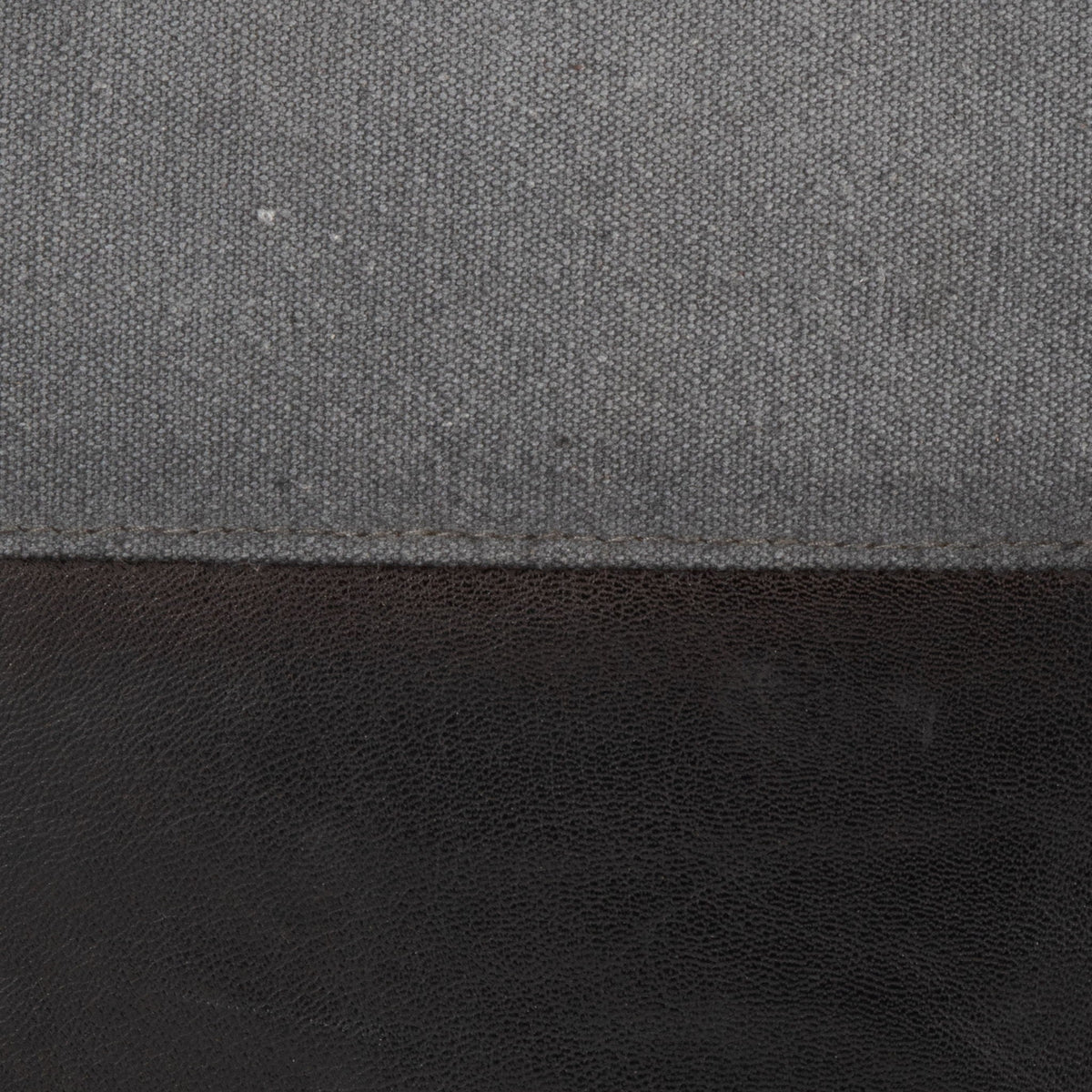 Industrial pouf ottoman upholstery fabric texture in dark gray woven weave on Tampa Home & Garden Store