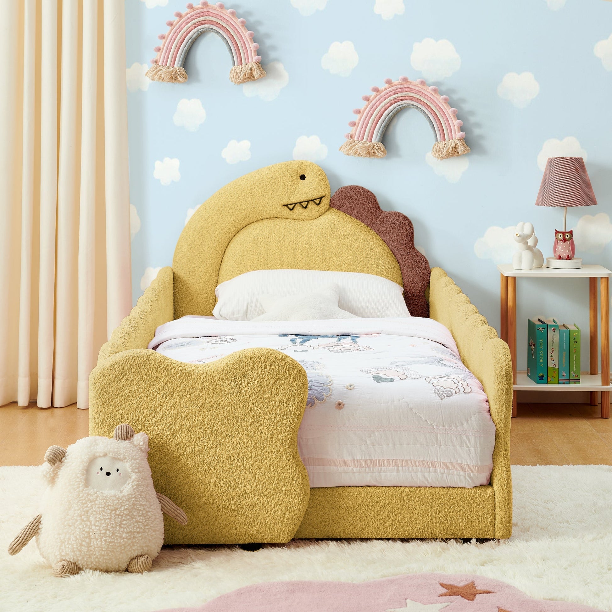 Twin Size Dinosaur-Shaped Kids Bed with Safety Guardrails in yellow plush with rainbow decor on Tampa Home & Garden Store