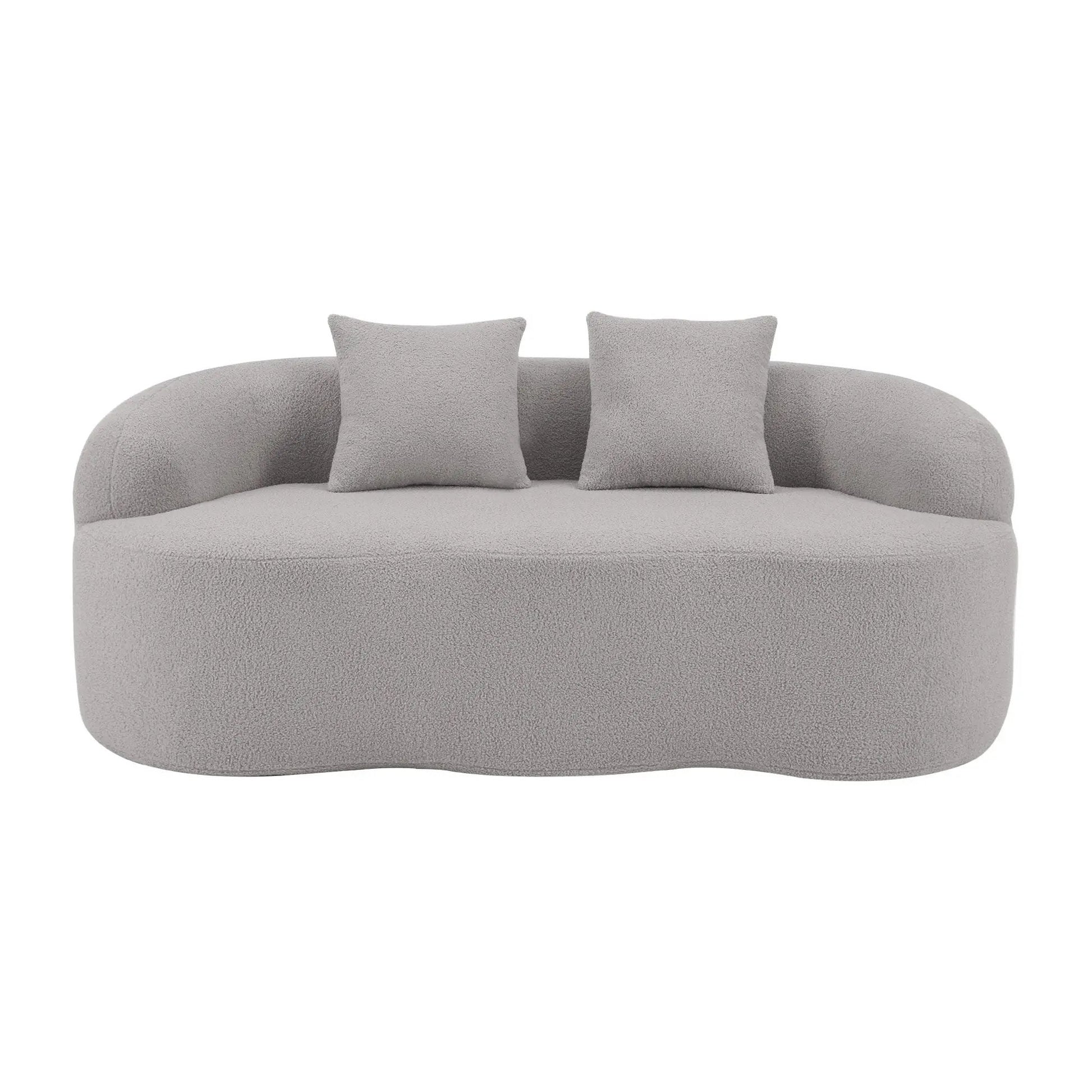 Curved loveseat sofa in light gray boucle fabric with round armrests and two cushions on Tampa Home & Garden Store