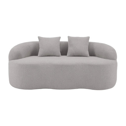 Curved loveseat sofa in light gray boucle fabric with round armrests and two cushions on Tampa Home & Garden Store