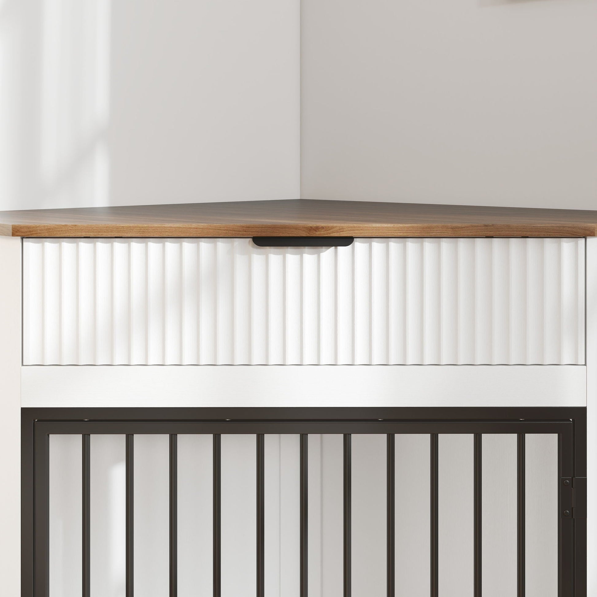 Corner Dog Crate by HouseOfZazla, black metal cage with vertical bars in a white cabinet on Tampa Home & Garden Store