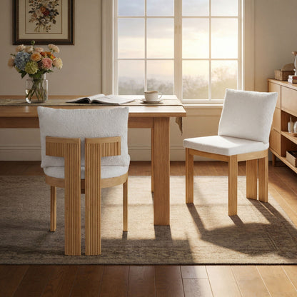 Boucle upholstered indoor dining chairs set of 2 with rubber wood frames around a wooden table on Tampa Home & Garden Store