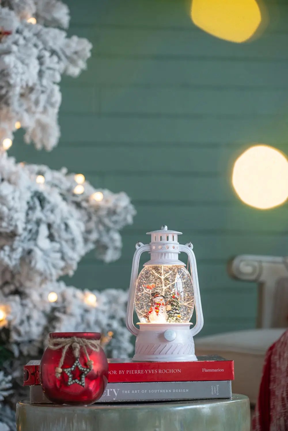White resin lantern with LED snowman and tree scene, glass globe on Tampa Home & Garden Store