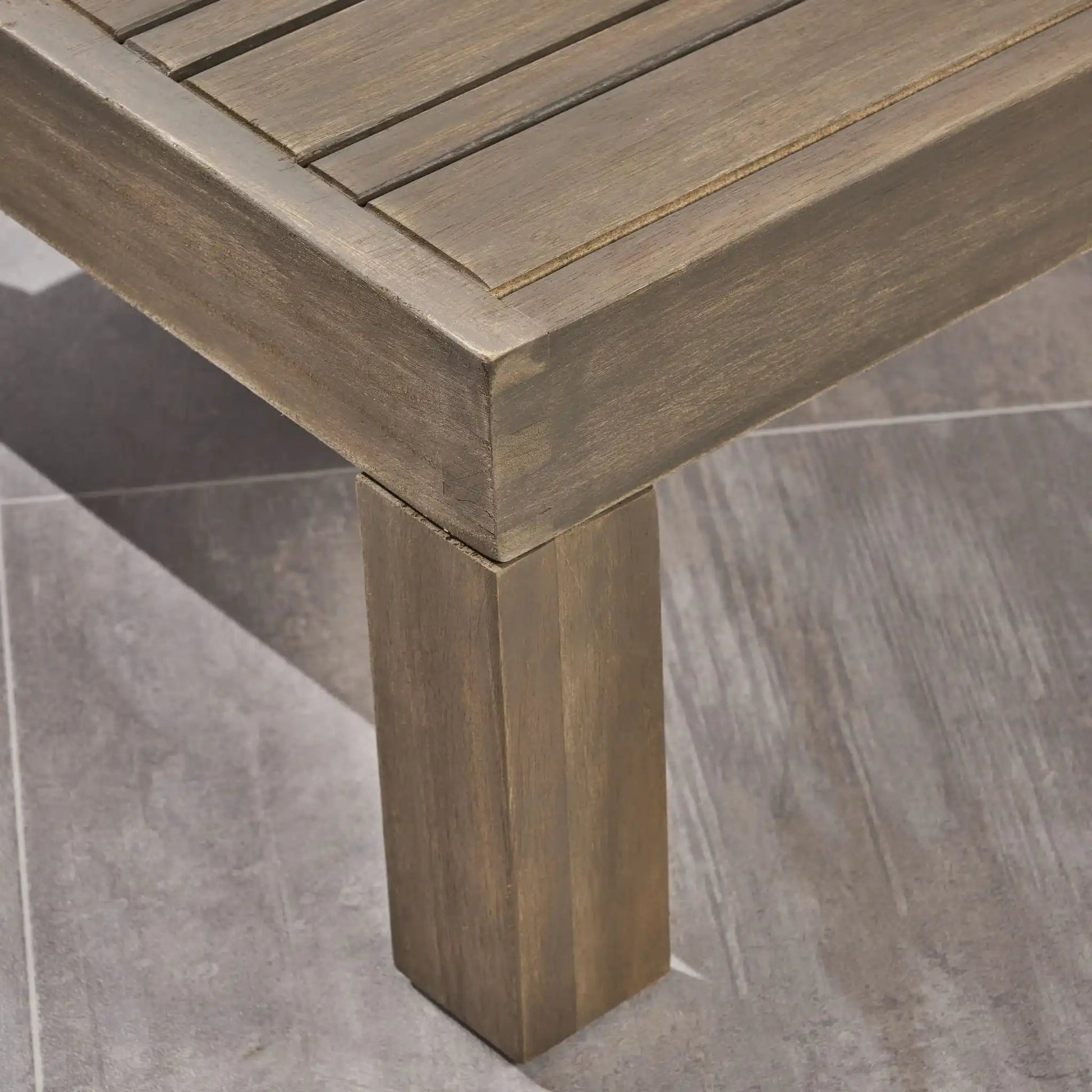 Alcove L-shaped outdoor sofa set wooden leg close-up in weathered brown finish on Tampa Home & Garden Store