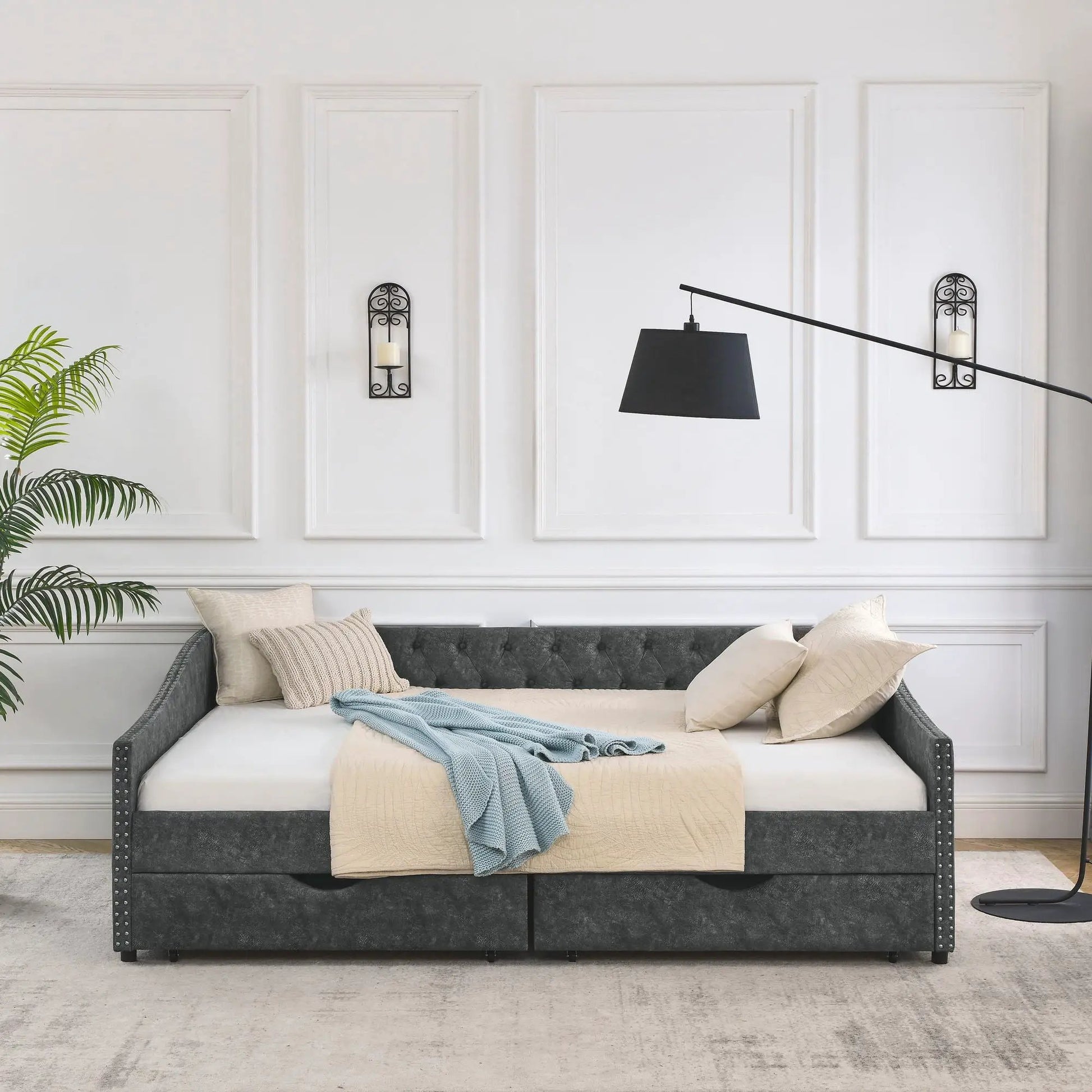 Upholstered tufted daybed with 2 drawers in dark gray fabric with nailhead trim on Tampa Home & Garden Store