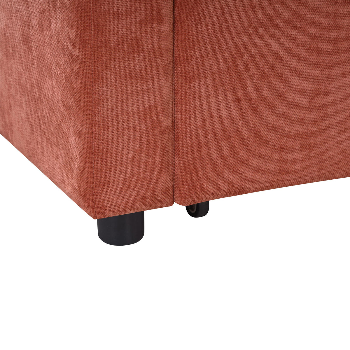 Modern rust-red L-shaped sleeper sectional base with visible seam and black block legs on Tampa Home & Garden Store