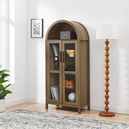 High arched storage cabinet by HouseOfZazla in warm wood with glass-front doors on Tampa Home & Garden Store