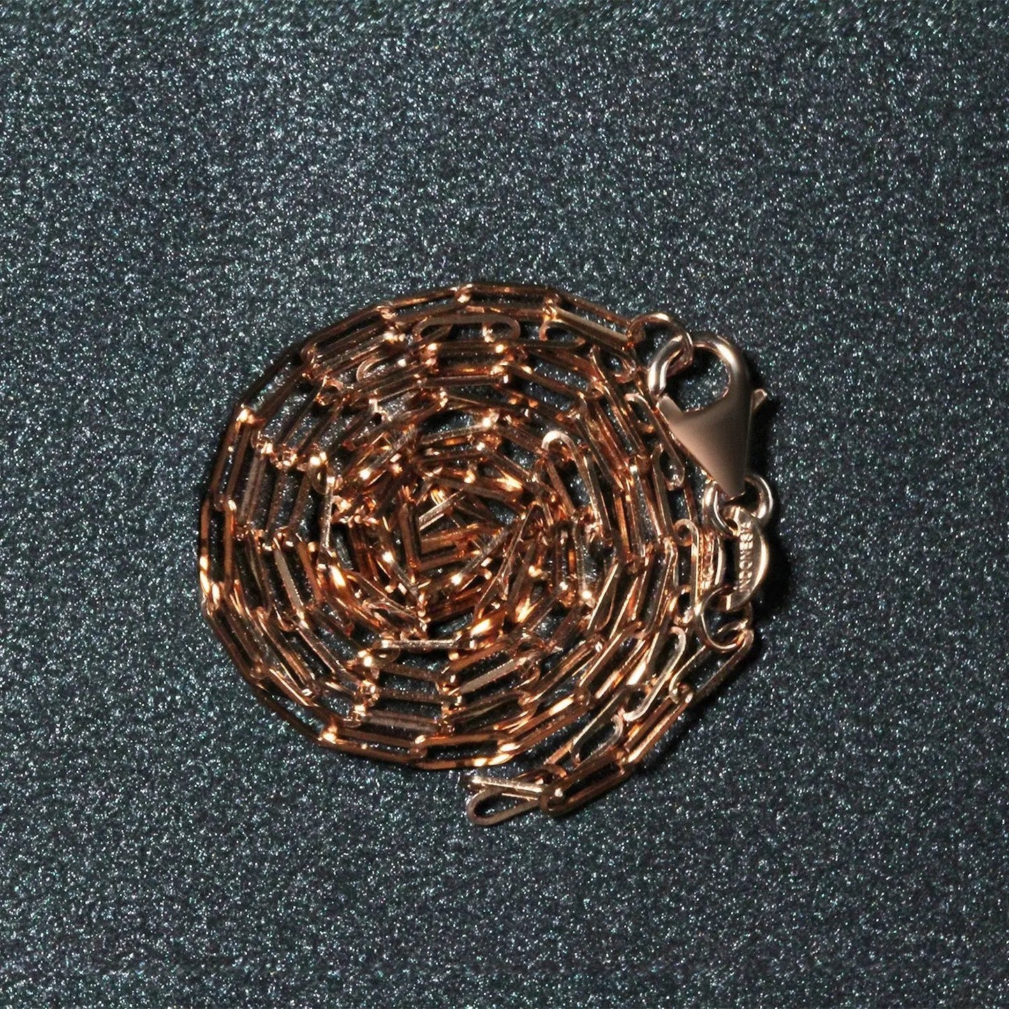 14K rose gold paperclip chain necklace by Bids.com, 1.5mm links, coiled presentation on Tampa Home & Garden Store