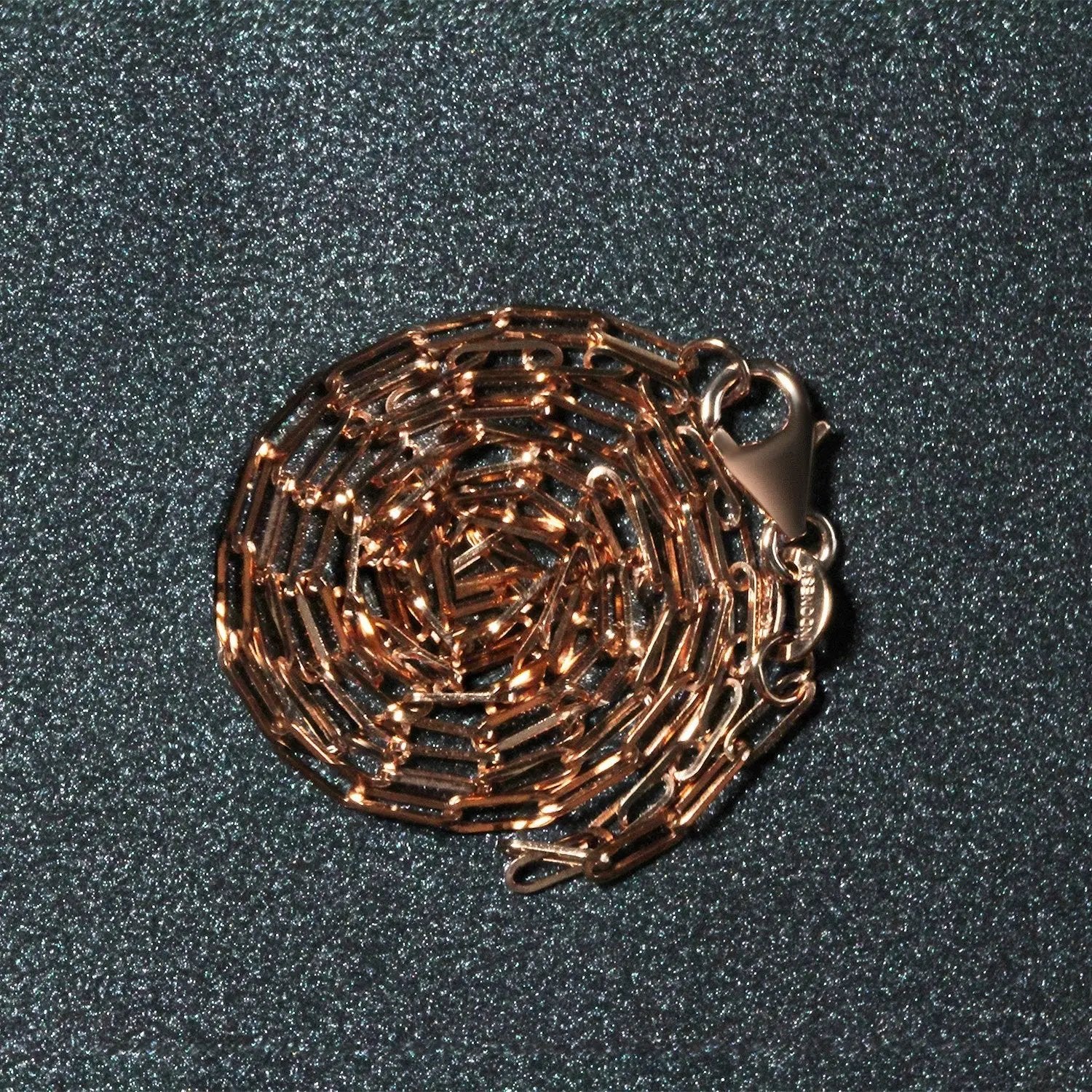 14K rose gold paperclip chain necklace by Bids.com, 1.5mm links, coiled presentation on Tampa Home & Garden Store
