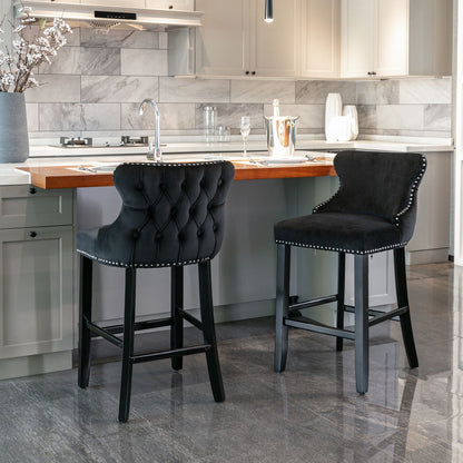 Upholstered wing-back barstools with button tufting and nailhead trim, set of 2, black fabric on Tampa Home & Garden Store