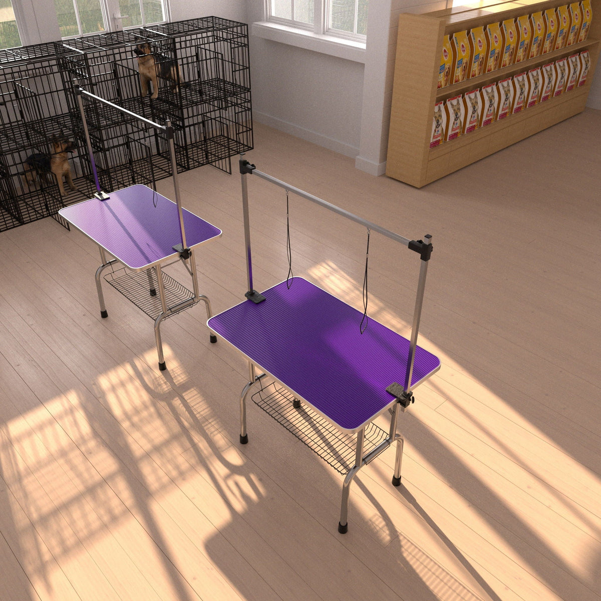 2 folding dog grooming tables with stainless frames and purple mats; adjustable arms near cages on Tampa Home & Garden Store