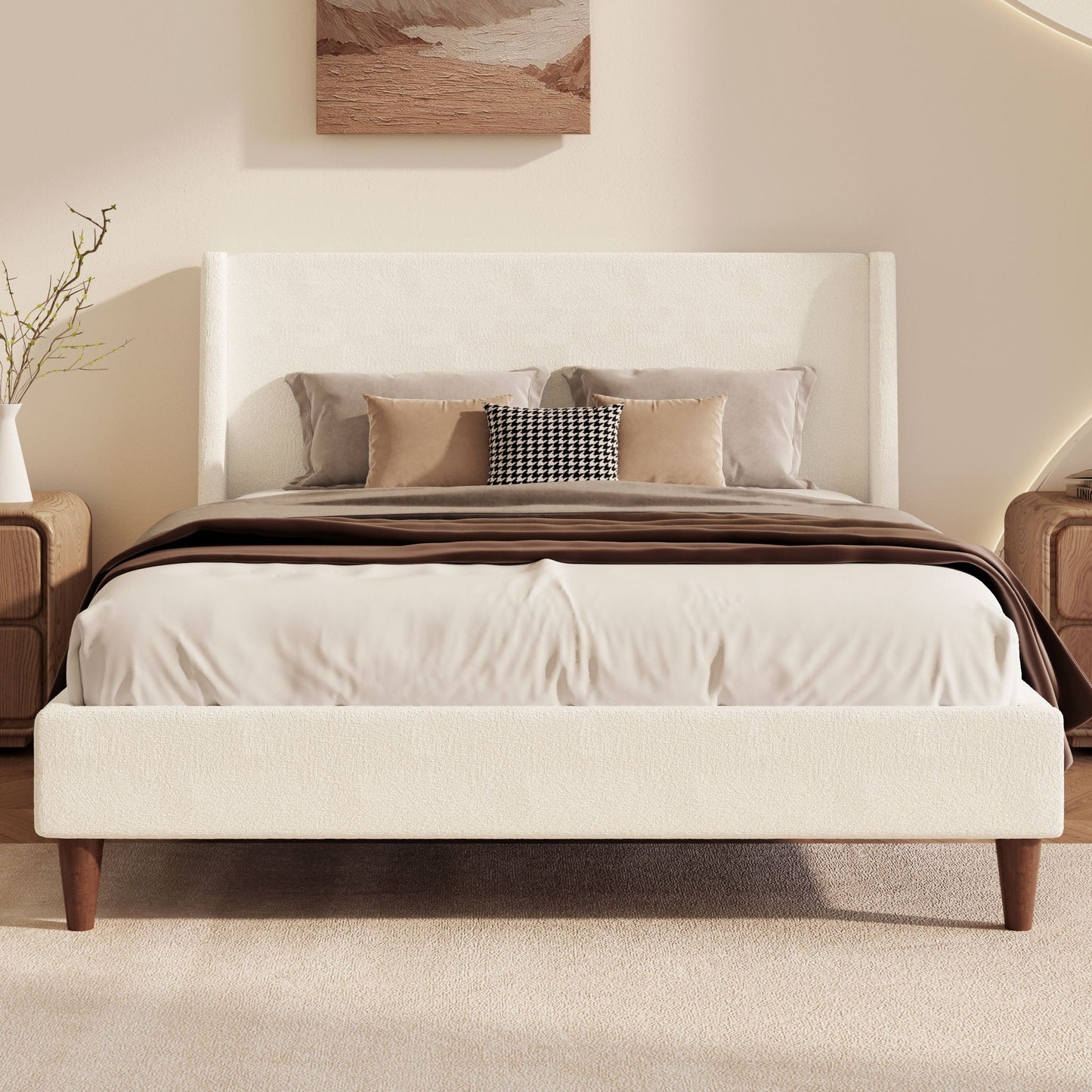 Upholstered modern platform bed with wingback headboard in cream fabric; neutral bedding on Tampa Home & Garden Store