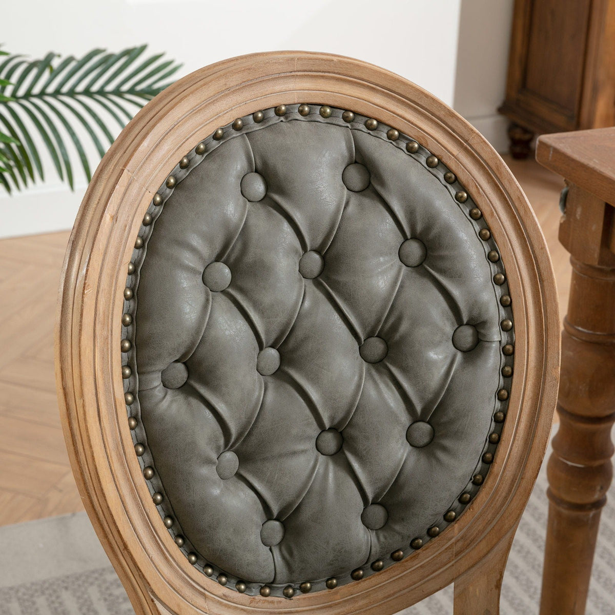 French Style Solid Wood Dining Chair with nailhead trim and tufted gray upholstery on Tampa Home & Garden Store