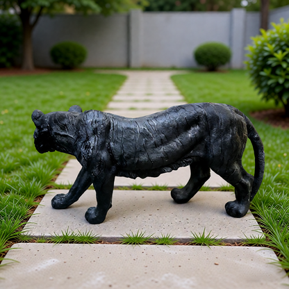 Simulated Black Tiger resin garden statue by HouseOfZazla; tiger sculpture on a stone path on Tampa Home & Garden Store