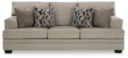 Stonemeade sofa by Unique Piece Furniture, beige sofa with two geometric-pattern pillows on Tampa Home & Garden Store